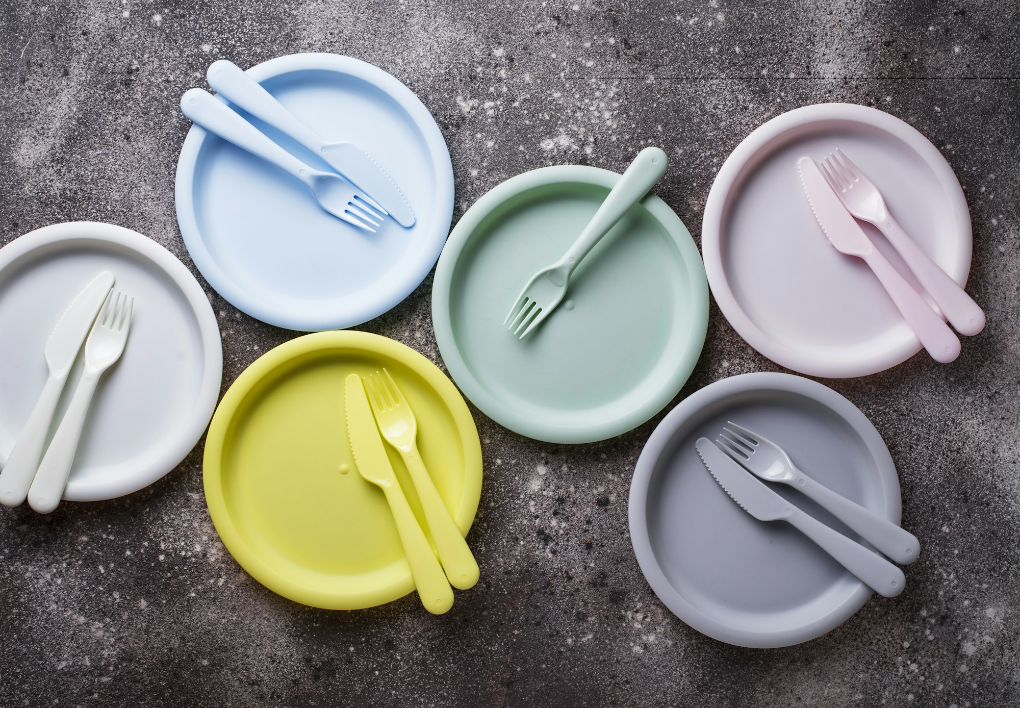 Colorful plastic dishes for summer picnic